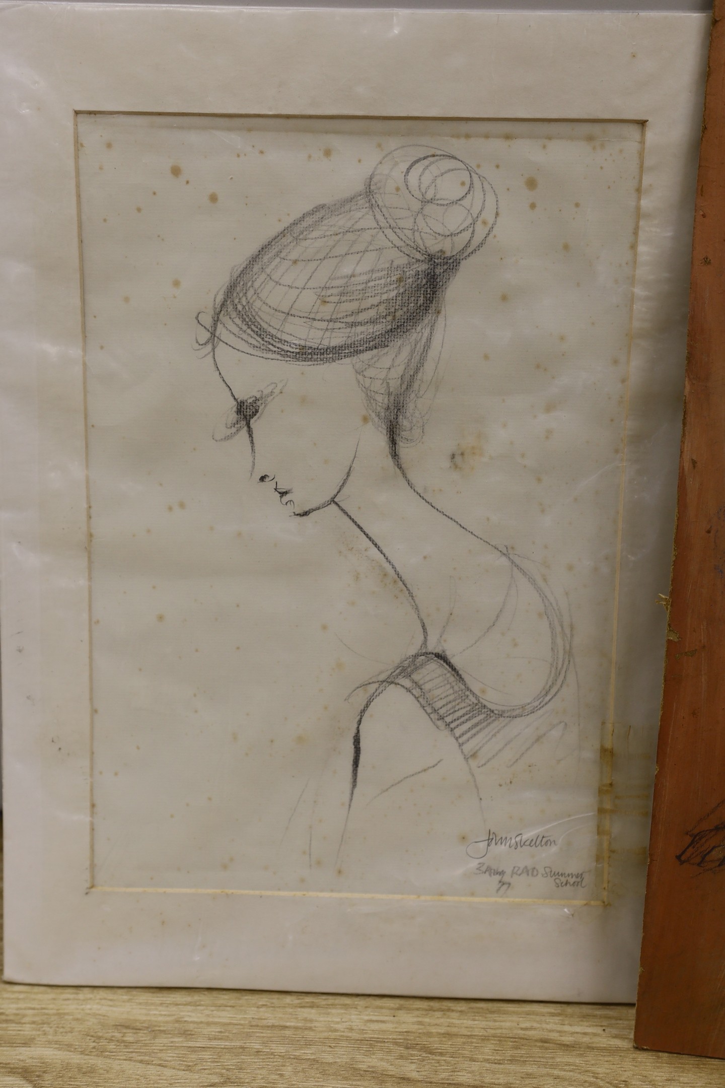 John Skelton (1923-2009) - Sketch of a seated nude, pastel and charcoal on board, signed, dated ‘56, unframed, 50 x 35cms. and head and shoulders study, charcoal on paper, signed and dated 3rd Aug. ‘77, inscribed “‘RAD S